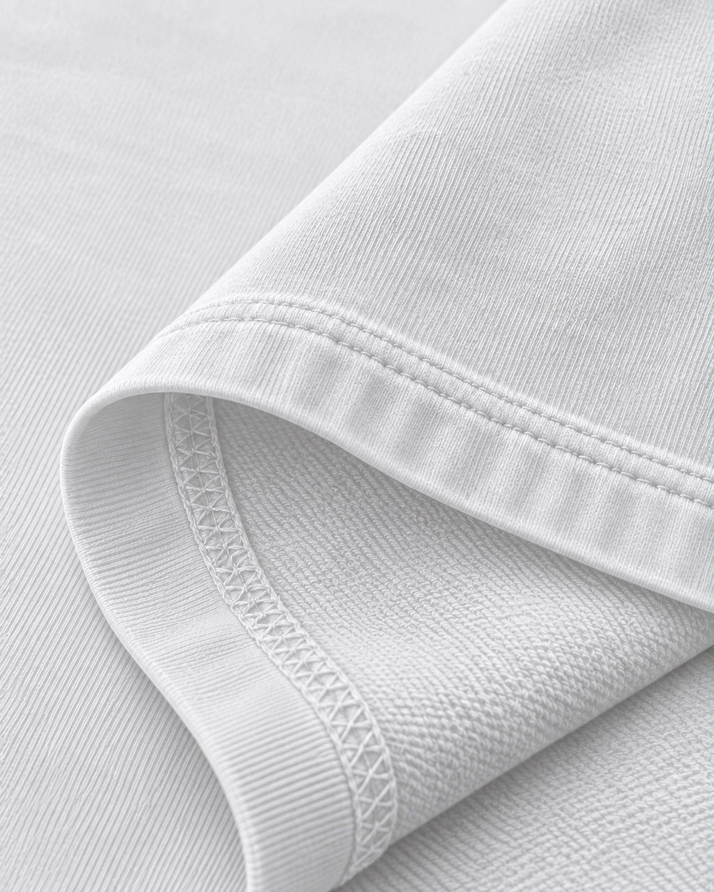 White oversized T-shirt fabric and hem stitching detail