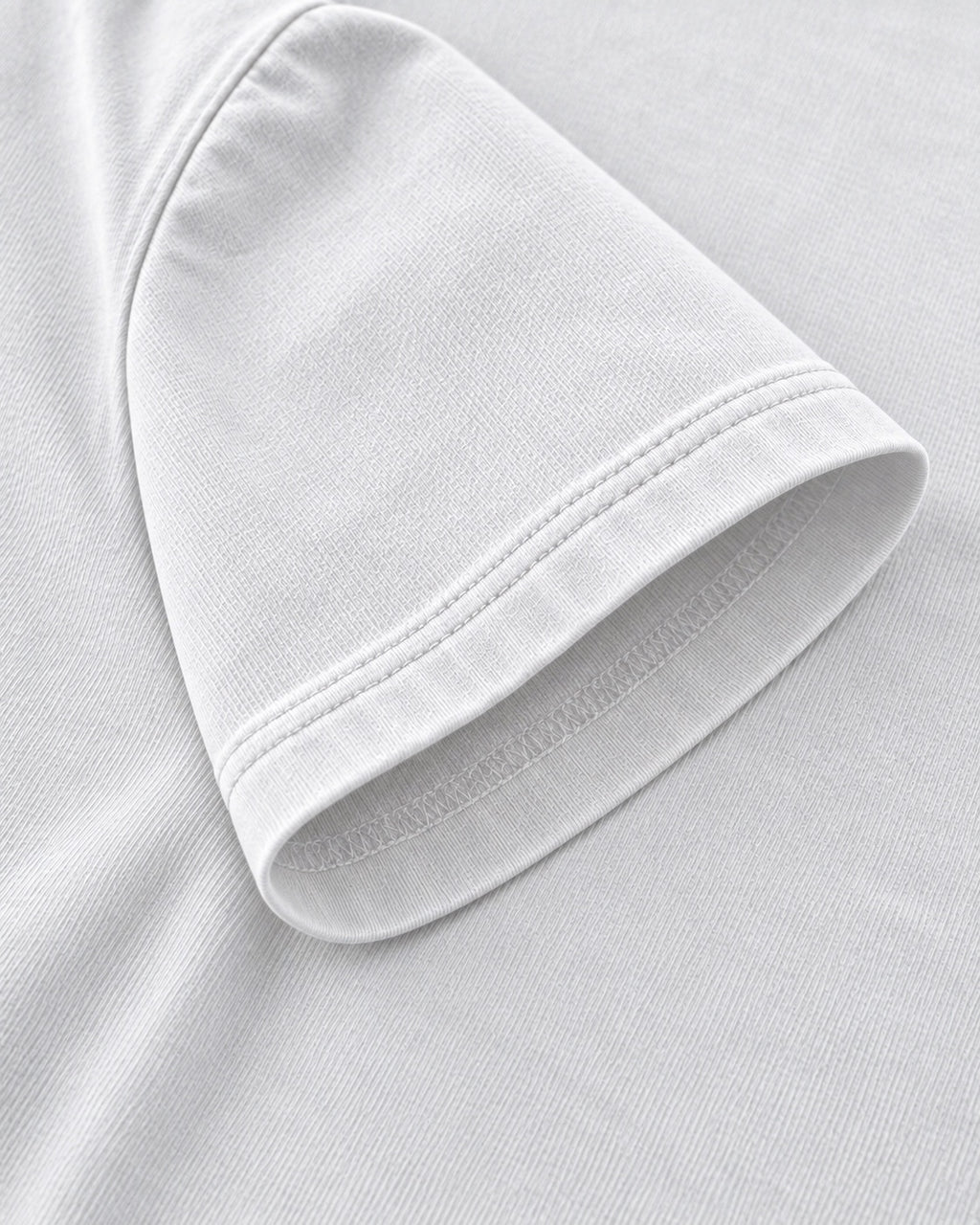 White oversized T-shirt sleeve and stitching close-up