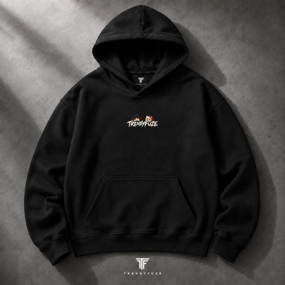 Trendy Fuze oversized black hoodie front with small couple cats chest graphic