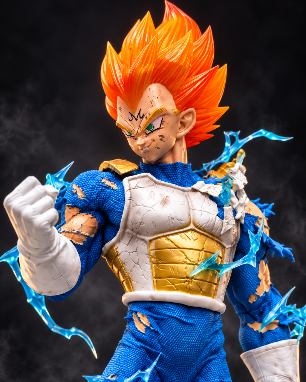 Majin Vegeta 40 cm battle worn figure close-up with Majin forehead mark, cracked armor and blue energy effects