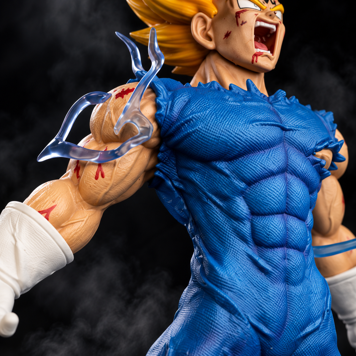 Majin Vegeta Final Atonement close-up torn blue suit and lightning effect detail