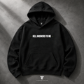 My Store black oversized pullover hoodie with white graphic chest print and kangaroo pocket on a concrete background