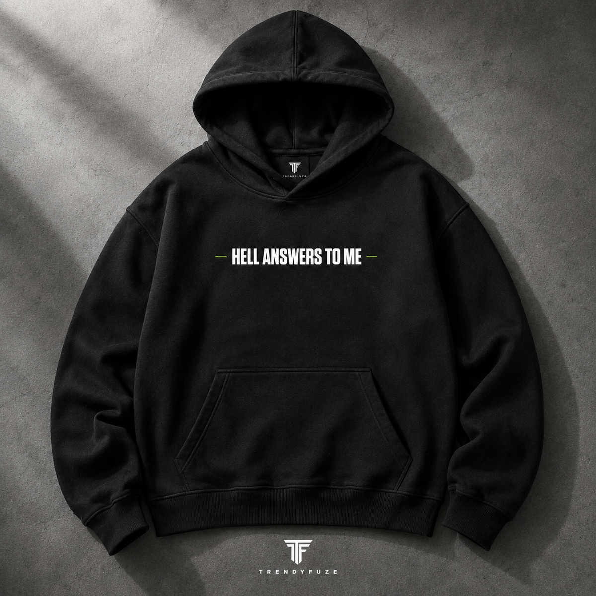 My Store black oversized pullover hoodie with white graphic chest print and kangaroo pocket on a concrete background