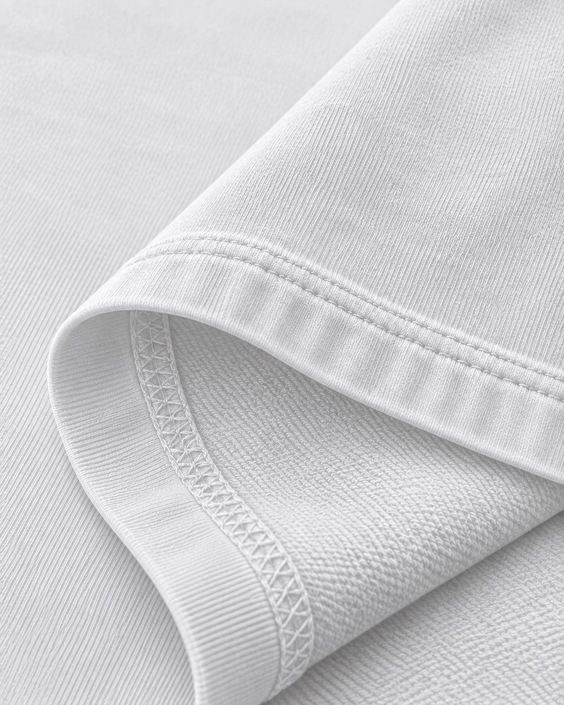 White oversized T-shirt fabric and hem stitching detail