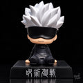 Satoru Gojo Jujutsu Kaisen seated chibi bobblehead figure with white spiky hair black blindfold black outfit and black Jujutsu Kaisen display base
