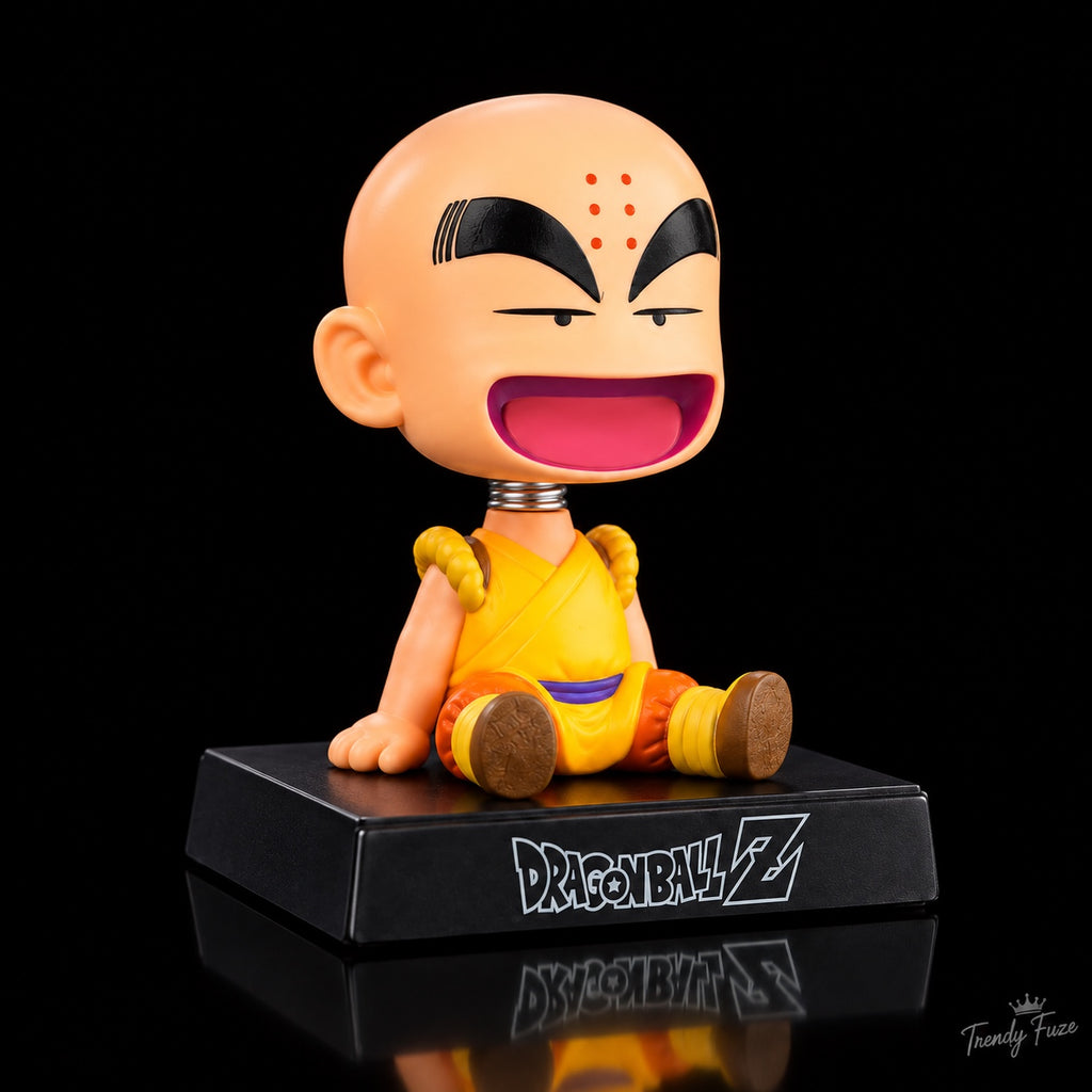 Krillin Dragon Ball Z bobblehead three quarter angle with laughing expression, bald head, visible spring neck and Dragon Ball Z logo display base