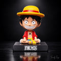 Monkey D. Luffy sitting One Piece anime bobblehead figure front view with straw hat and black display base