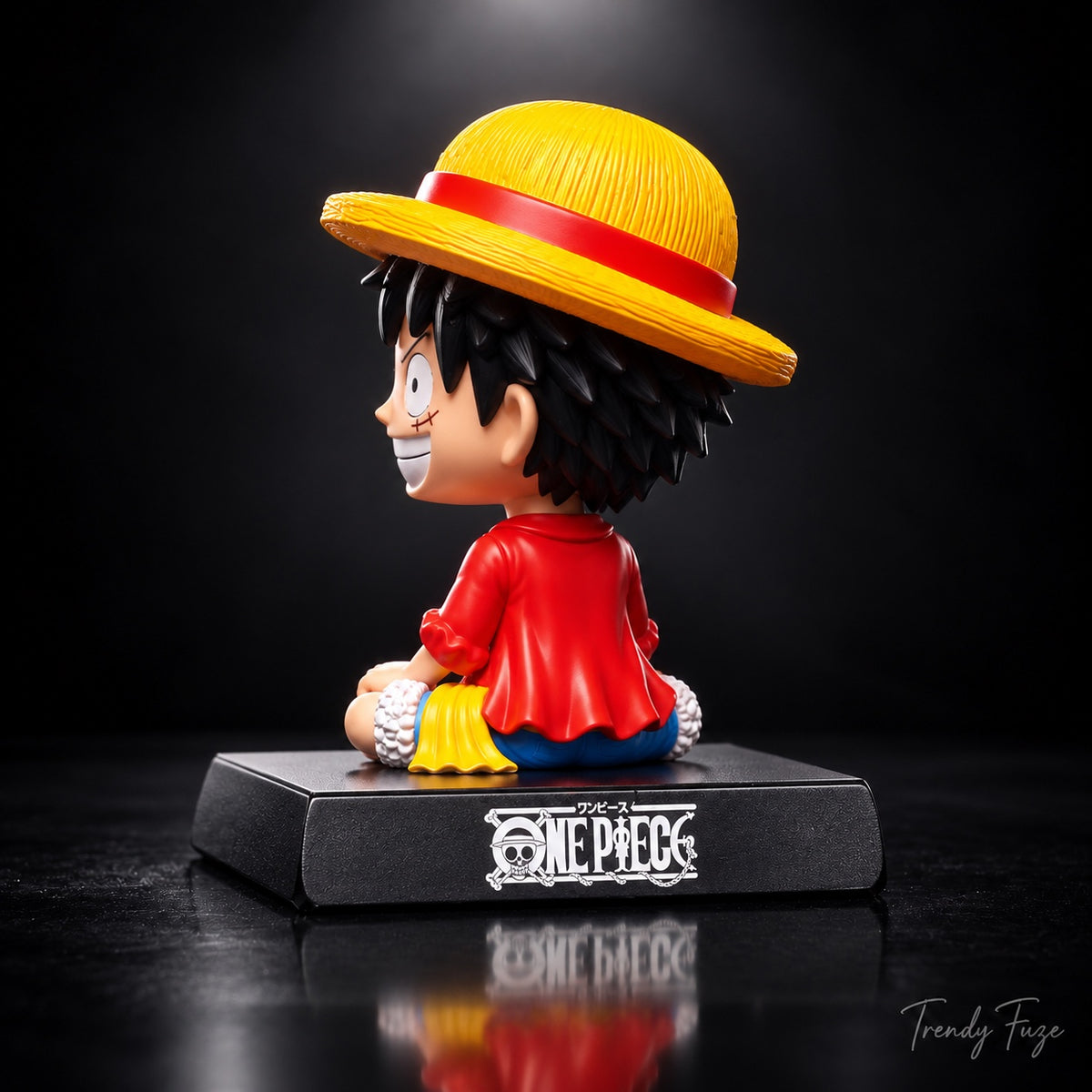 One Piece Monkey D. Luffy sitting bobblehead collectible side view red jacket straw hat