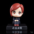 Nobara Kugisaki sitting Jujutsu Kaisen bobblehead-style anime figure with auburn bob-cut hair, black school uniform and red-brown shoes, front view